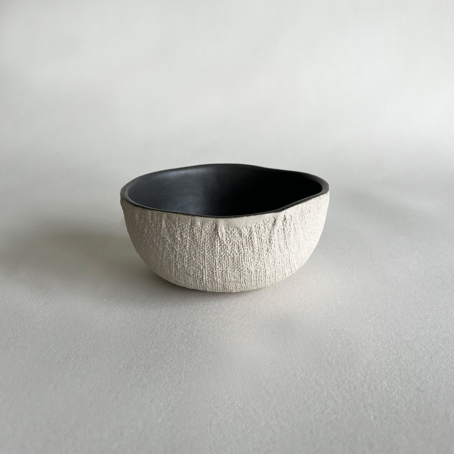 beige handmade ceramic bowl
