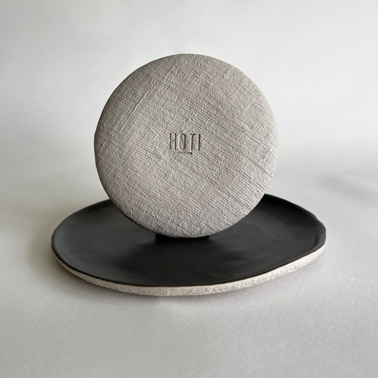 beige charcoal textured ceramic set of plates