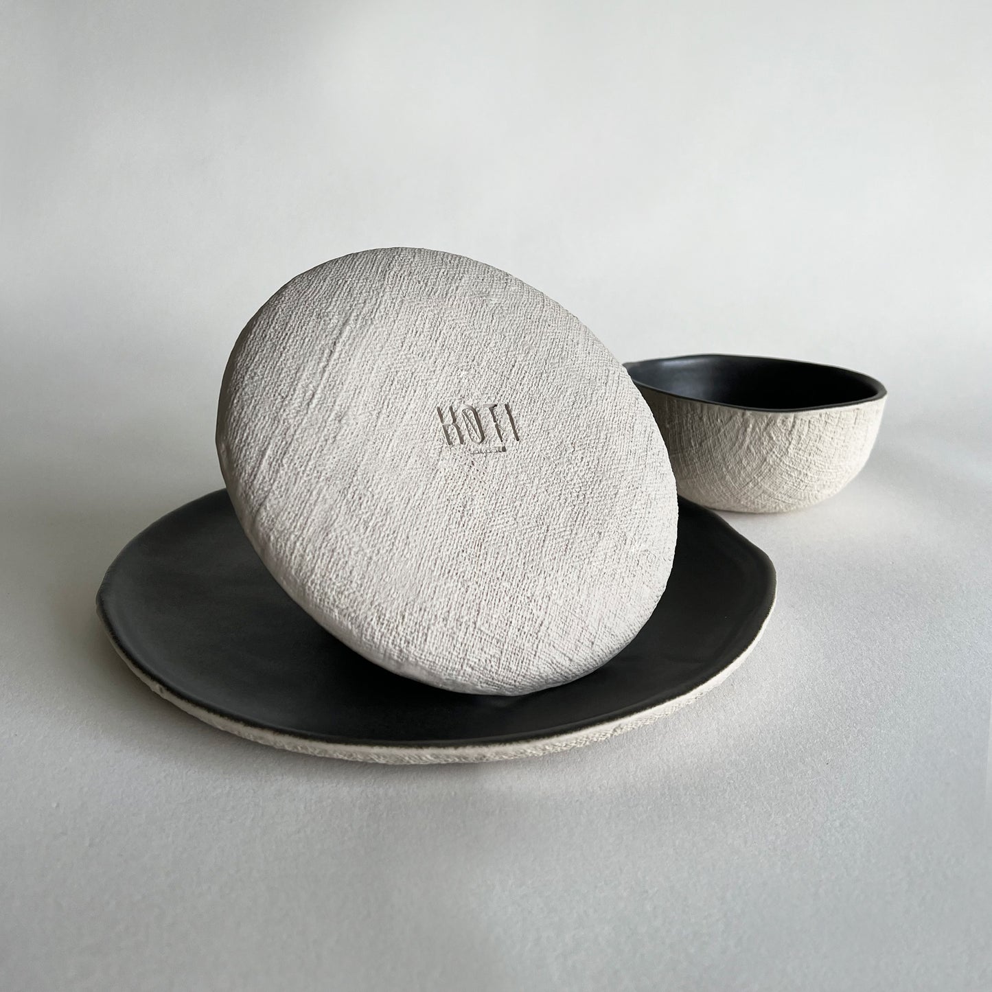 handmade ceramic set of plates and bowl