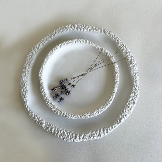 white handmade ceramic plates