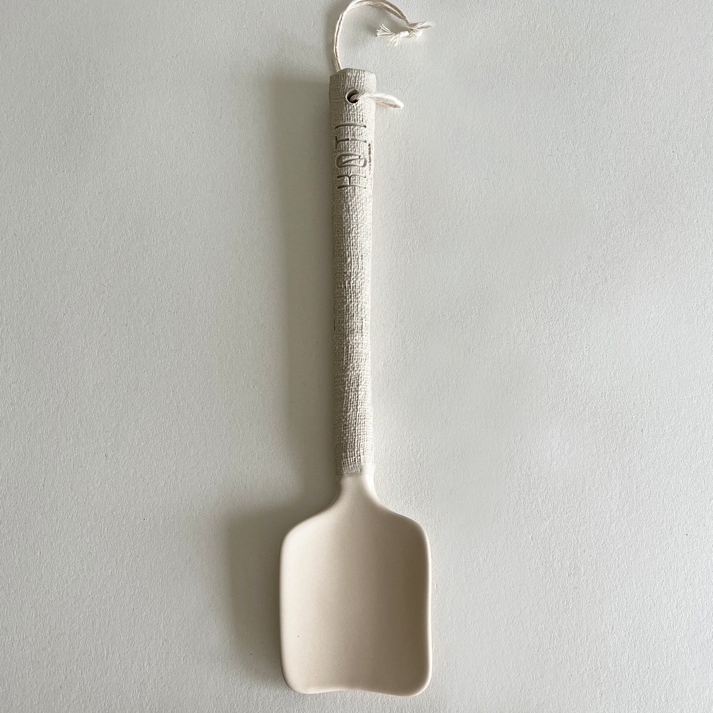 beige large handmade serving spoons, textured cutlery, ceramic salad spoons, stoneware spoon
