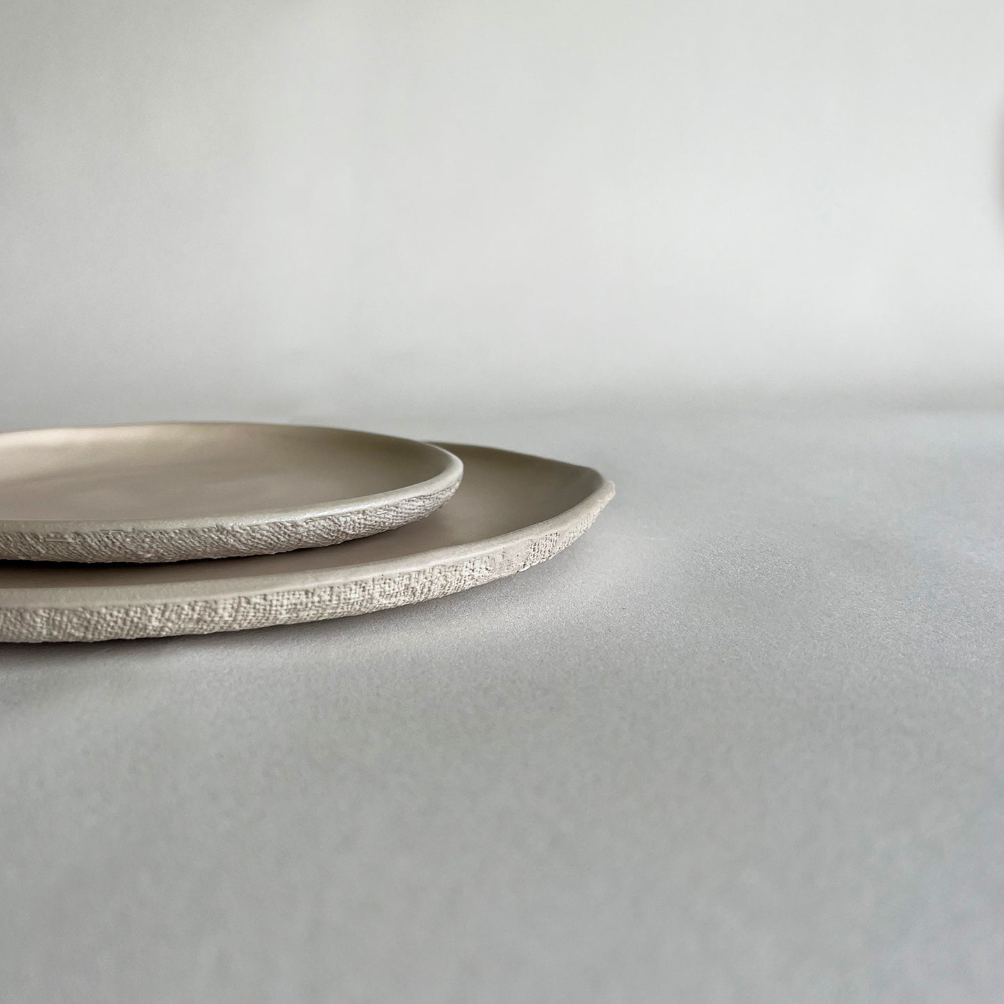 beige matte textured ceramic dinnerware set, large plate, dinner plate, small plate, dessert plate, appetizer plate