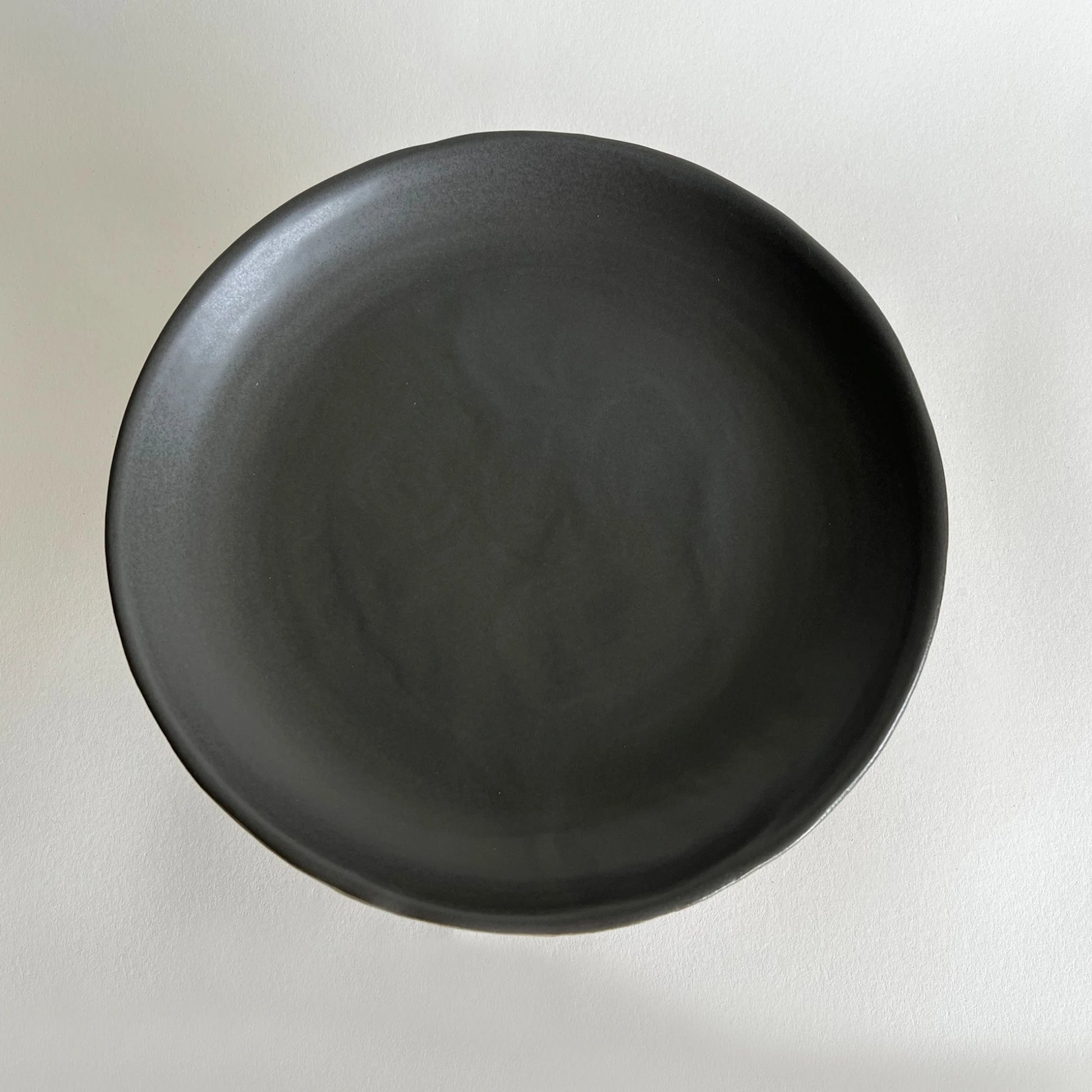Large matte charcoal ceramic handmade serving platter.