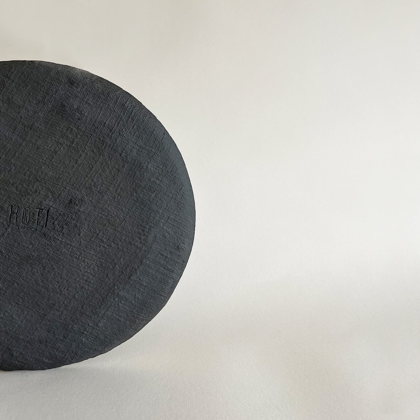 large black matte textured unique organic handmade ceramic dinner plate