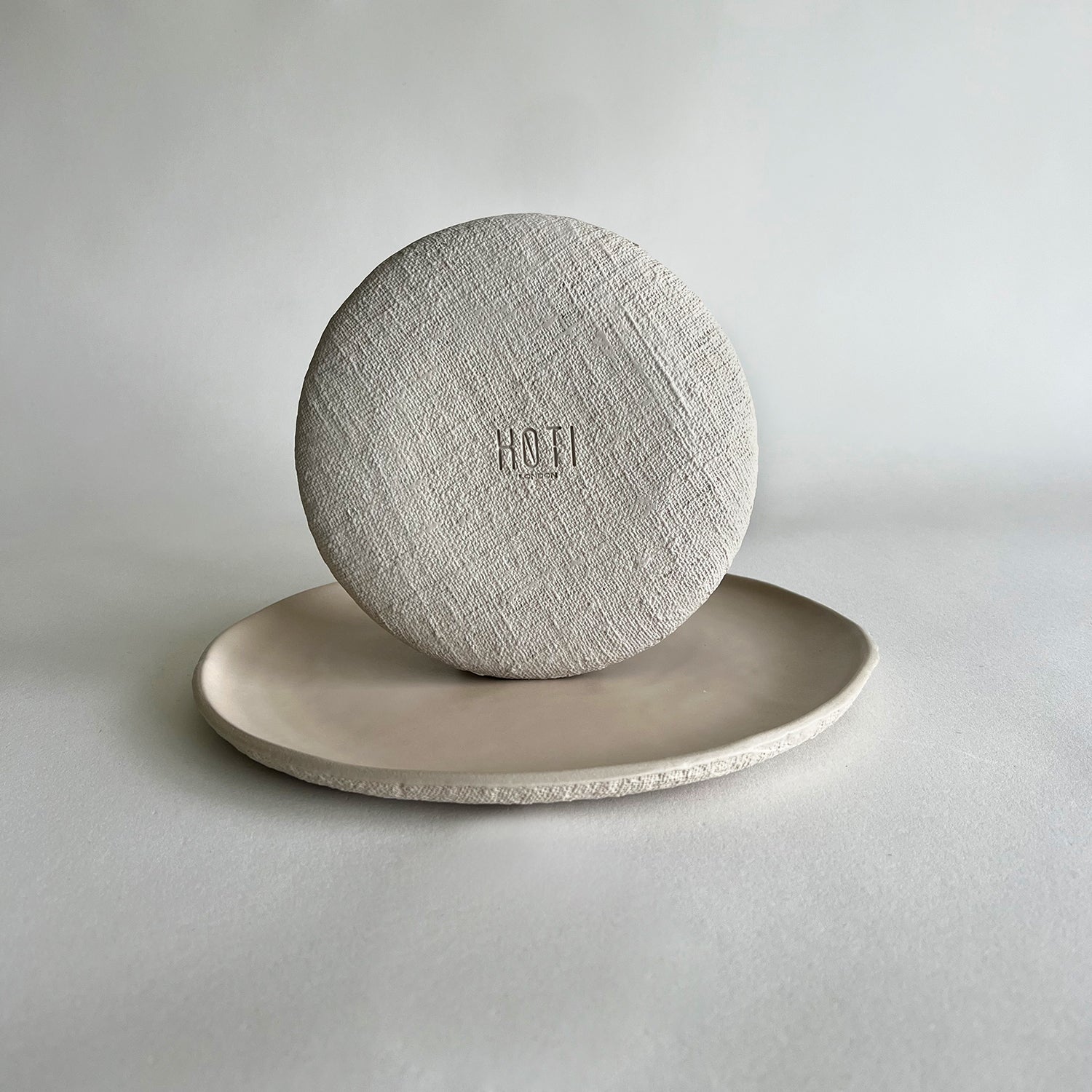 beige matte textured handmade ceramic set of plates