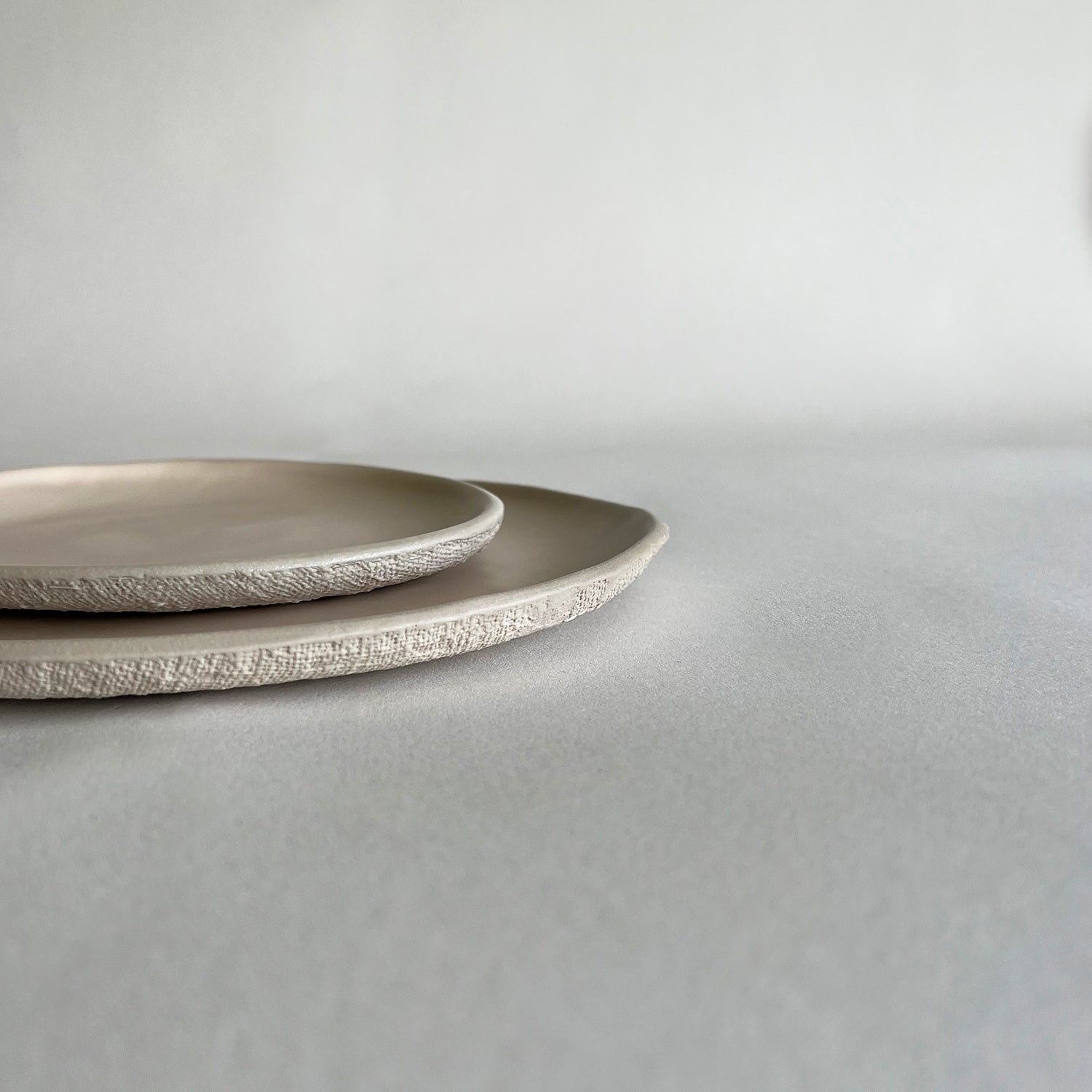 beige matte textured ceramic dinnerware set, large plate, dinner plate, small plate, dessert plate, appetizer plate